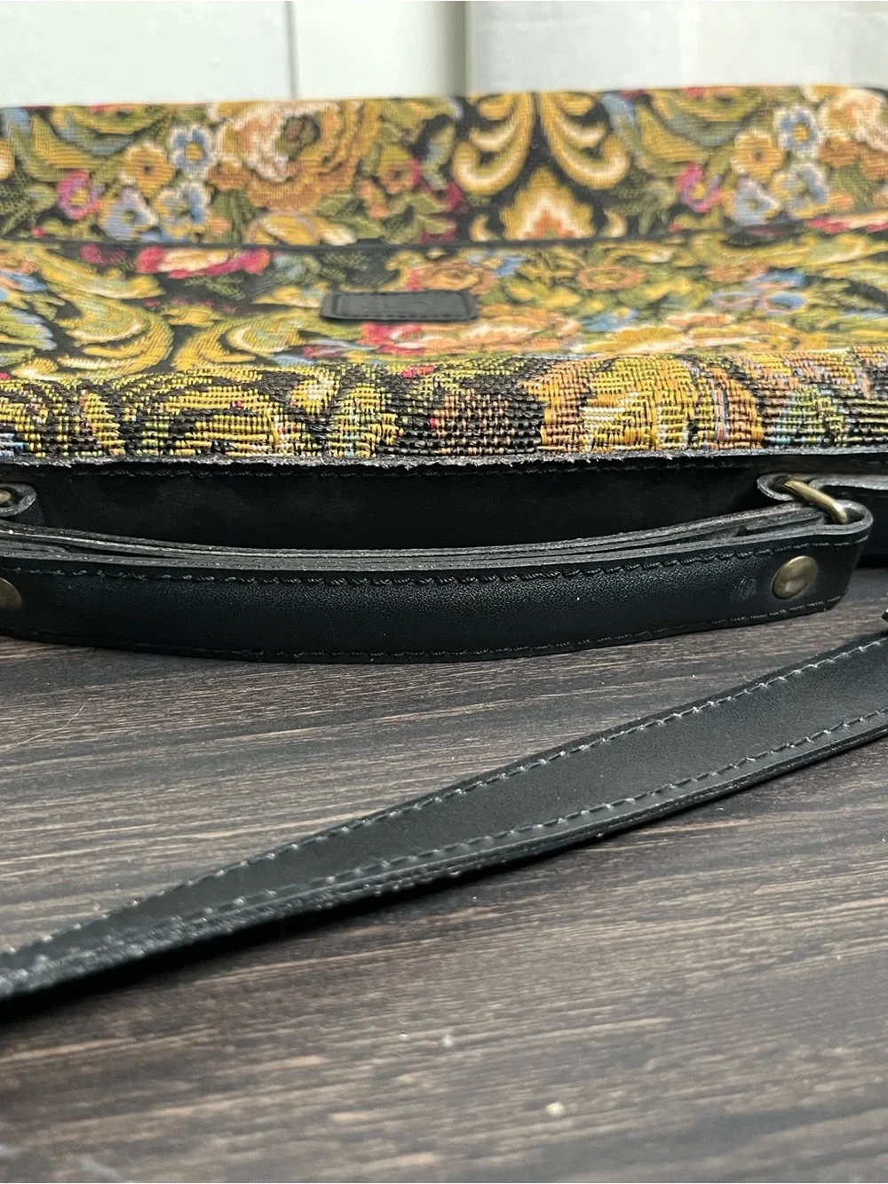 Geoffrey Beene messenger bag ft vibrant floral tapestry ext & black leather trim